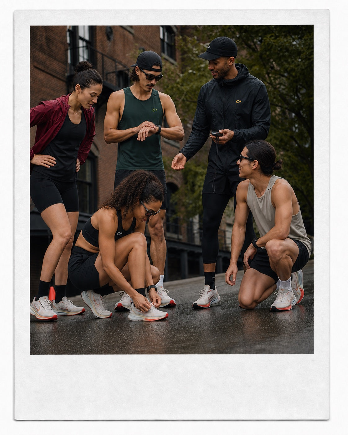 A confident community of runners preparing together at an urban basecamp